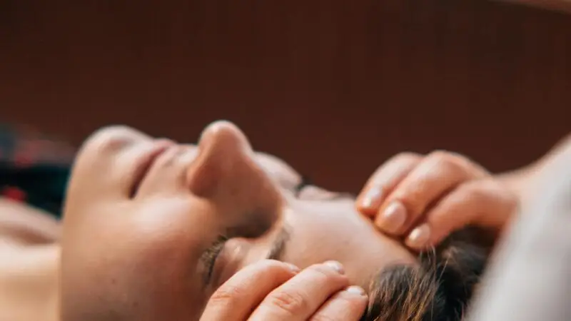 Woman having a face massage